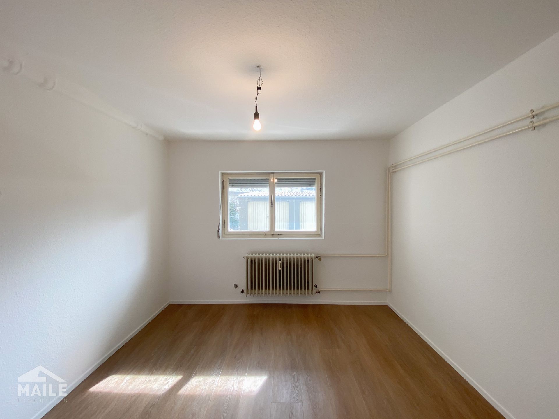 Frisch renovierte 4-Zimmer-Wohnung mit sonnigem Balkon, großem Hobbyraum und Garage! - Hobbyraum/ Home Office