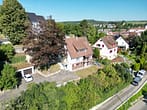 Entkerntes Zweifamilienhaus mit Terrassengarten, Doppelgarage und toller Aussicht! - Ansicht Süd-/Ostseite